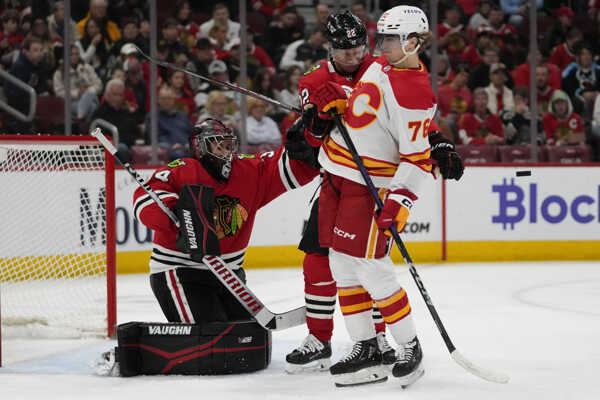 Slovenský hokejista Martin Pospíšil v drese Calgary Flames. Slovenský hokejista Martin Pospíšil v drese Calgary Flames.